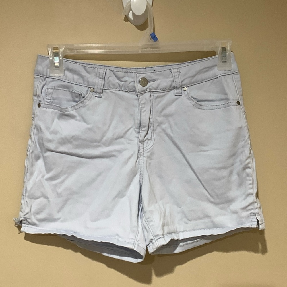 Miss Poured in Blue shorts